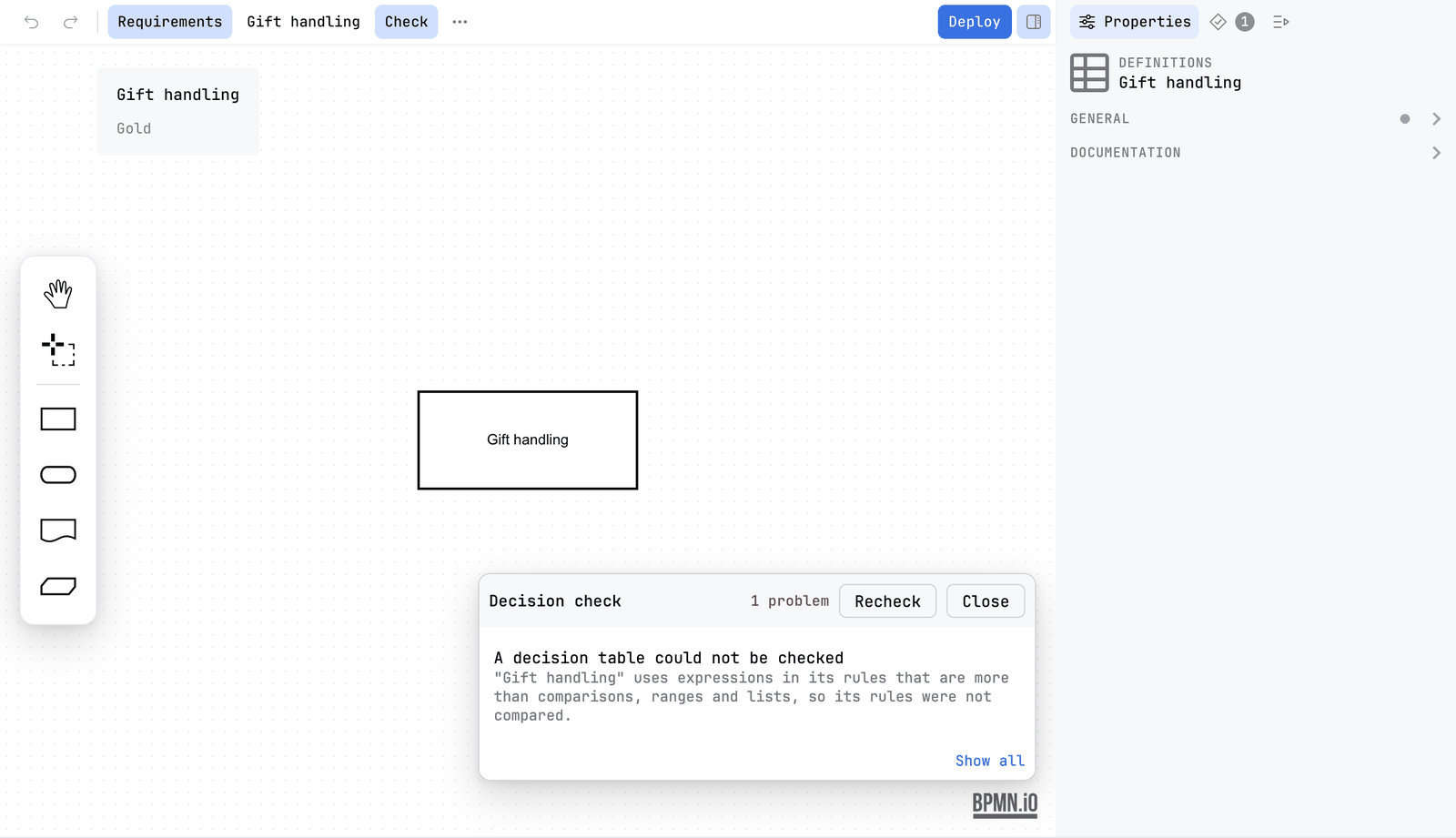 The Requirements view with the Decision check card open. It reads 1 problem, with Recheck and Close, and the finding A decision table could not be checked: Gift handling uses expressions in its rules that are more than comparisons, ranges and lists, so its rules were not compared. Show all is at the foot