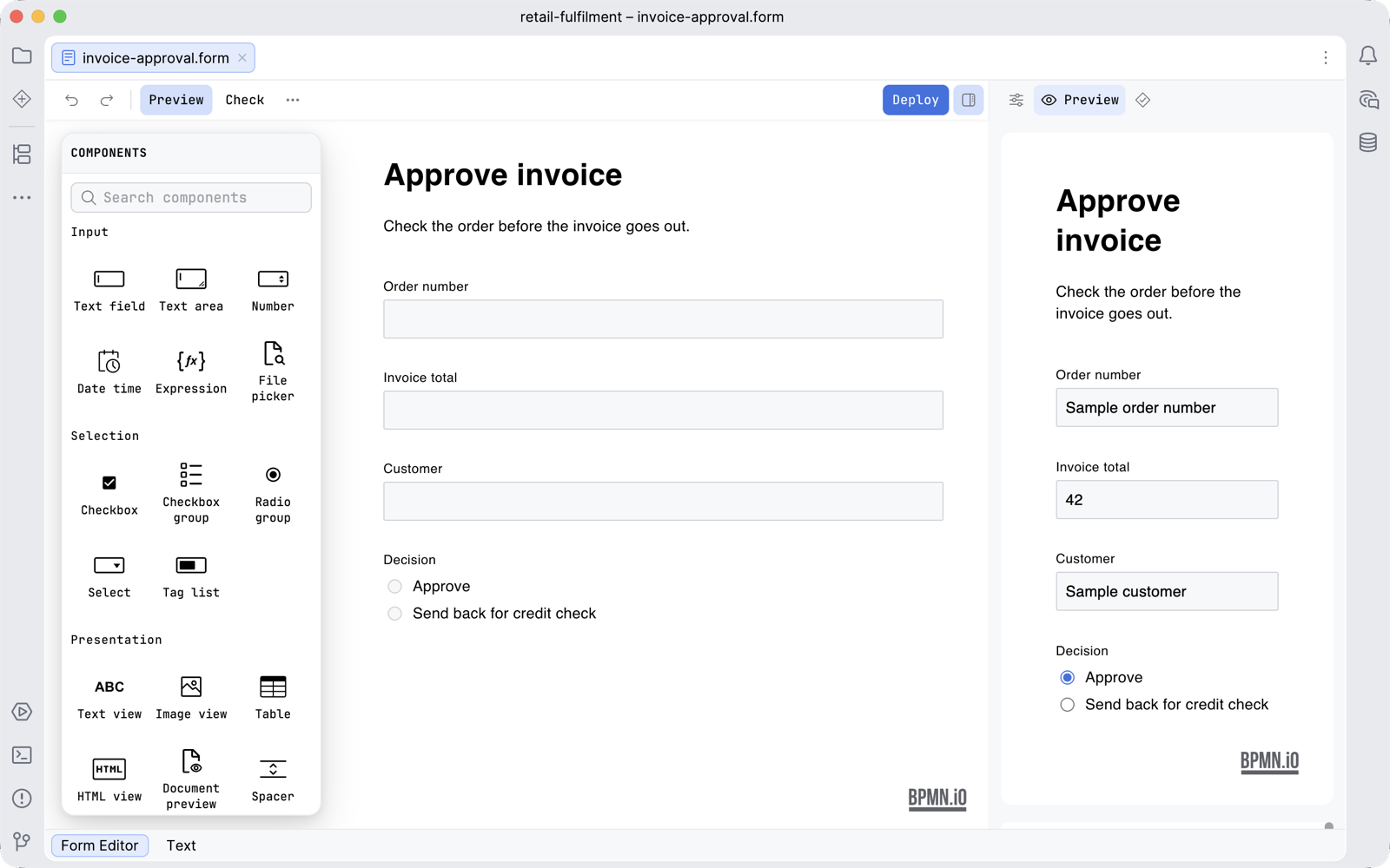 The invoice approval form open in the form editor, with the Components palette at the left of the canvas and the Preview tab of the sidebar showing the same form as a user sees it, filled with sample values